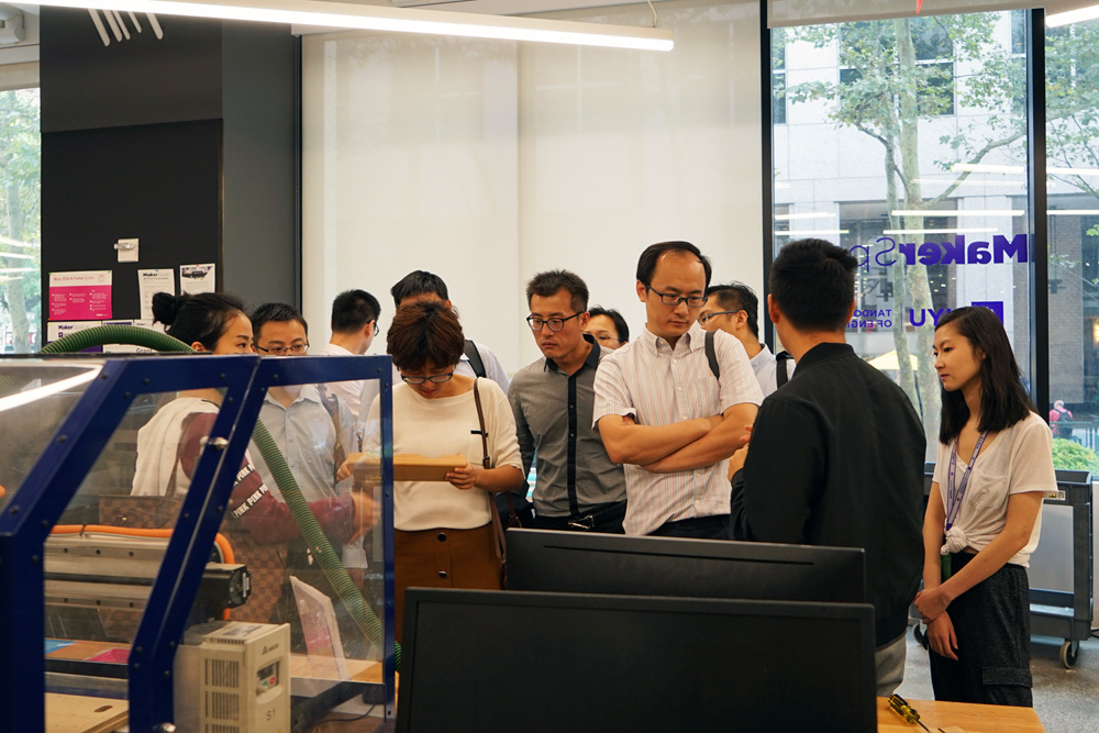 Students give the delegation from Tianjin Municipal Engineering Design & Research Institute a tour of the MakerSpace.