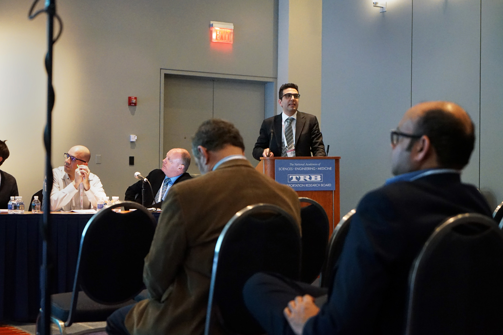 Postdoctoral researcher Onur Kalan presents during a lectern session at TRB.