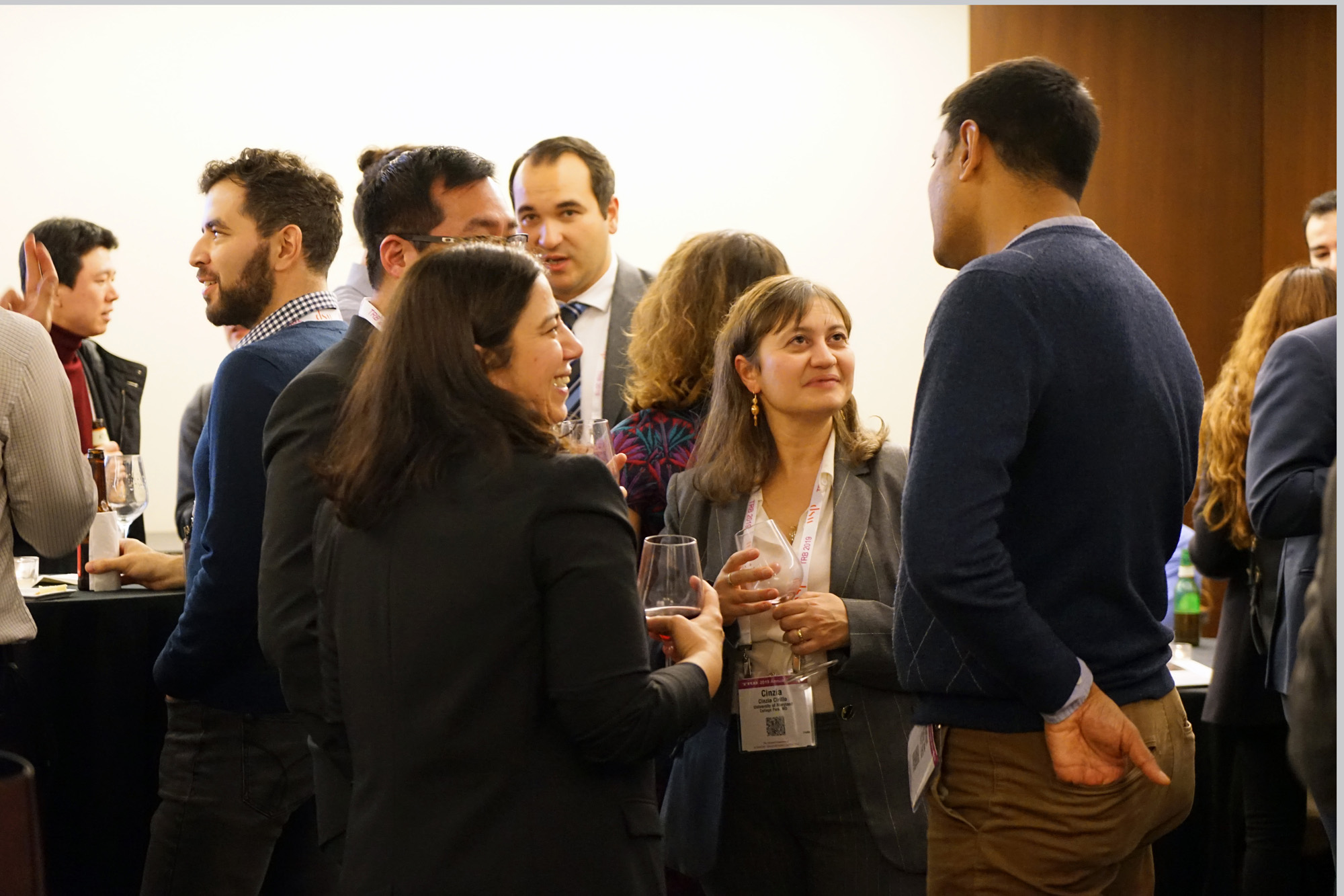Attendees talk over drinks at the NYU/C2SMART reception