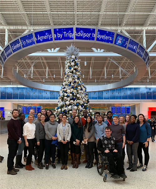 Emerging leaders exploring Terminal 5 and enjoying the holiday decor